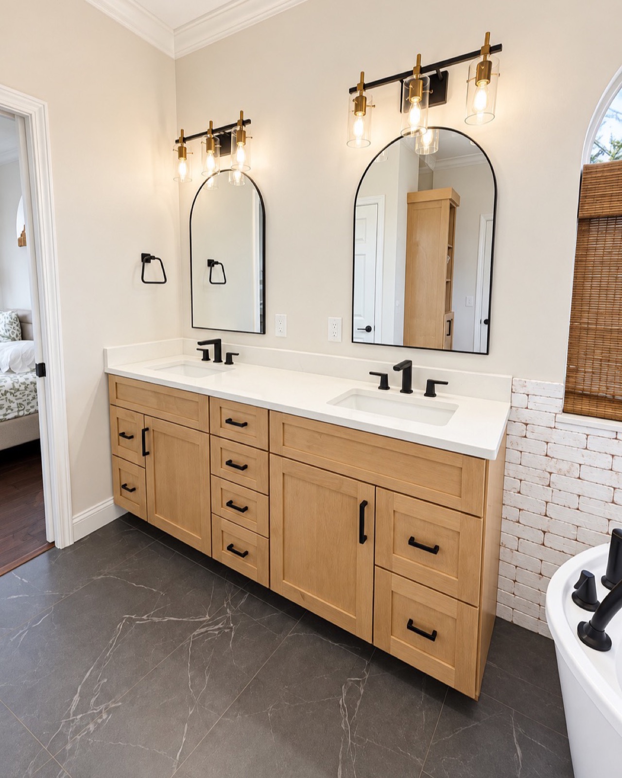 Design rendering of the remodeled double vanity with arched mirrors and matte black fixtures, 3 Day Kitchen and Bath, Collinsville IL (St. Louis metro)